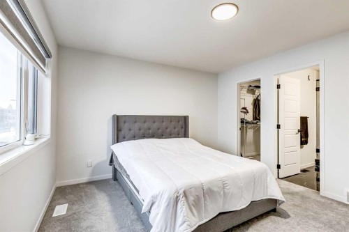 184 Rowmont Boulevard Nw, Calgary, AB - Indoor Photo Showing Bedroom