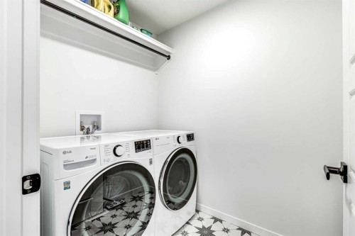 184 Rowmont Boulevard Nw, Calgary, AB - Indoor Photo Showing Laundry Room