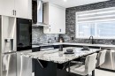 184 Rowmont Boulevard Nw, Calgary, AB  - Indoor Photo Showing Kitchen With Upgraded Kitchen 