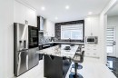 184 Rowmont Boulevard Nw, Calgary, AB  - Indoor Photo Showing Kitchen With Upgraded Kitchen 