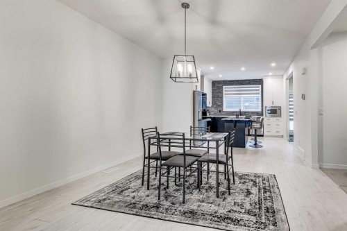 184 Rowmont Boulevard Nw, Calgary, AB - Indoor Photo Showing Dining Room