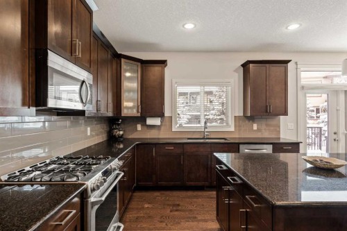 6 Crestridge Mews Sw, Calgary, AB - Indoor Photo Showing Kitchen With Upgraded Kitchen