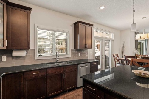 6 Crestridge Mews Sw, Calgary, AB - Indoor Photo Showing Kitchen With Double Sink