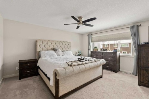6 Crestridge Mews Sw, Calgary, AB - Indoor Photo Showing Bedroom