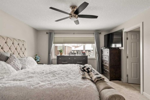 6 Crestridge Mews Sw, Calgary, AB - Indoor Photo Showing Bedroom