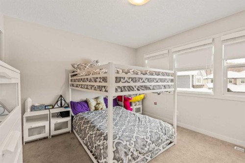 6 Crestridge Mews Sw, Calgary, AB - Indoor Photo Showing Bedroom