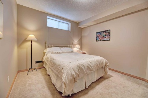 73 Cresthaven View Sw, Calgary, AB - Indoor Photo Showing Bedroom