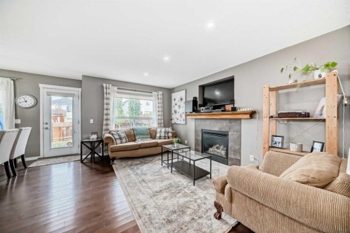 127 Covepark Green Ne, Calgary, AB - Indoor Photo Showing Living Room With Fireplace