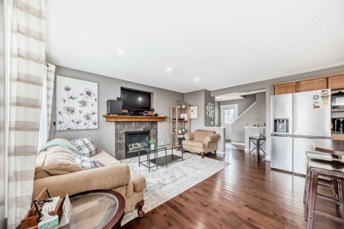 127 Covepark Green Ne, Calgary, AB - Indoor Photo Showing Living Room With Fireplace