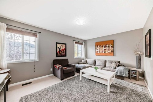 127 Covepark Green Ne, Calgary, AB - Indoor Photo Showing Living Room