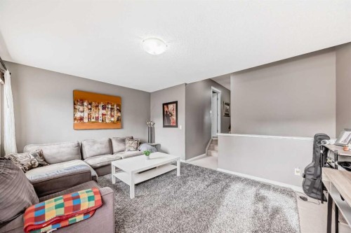 127 Covepark Green Ne, Calgary, AB - Indoor Photo Showing Living Room