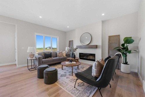 19 Clearwater Lane, Chestermere, AB - Indoor Photo Showing Living Room With Fireplace