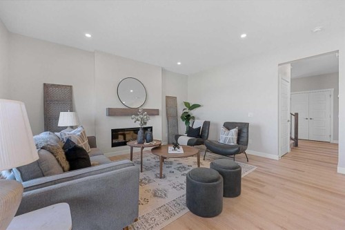 19 Clearwater Lane, Chestermere, AB - Indoor Photo Showing Living Room With Fireplace