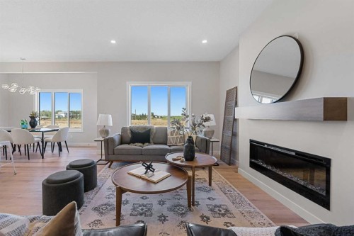 19 Clearwater Lane, Chestermere, AB - Indoor Photo Showing Living Room With Fireplace