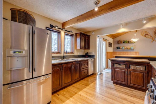 51 Manyhorses Drive, Rural Rocky View County, AB - Indoor Photo Showing Kitchen With Double Sink