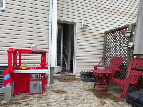 8-304 Ross Avenue, Cochrane, AB - Outdoor With Deck Patio Veranda With Exterior