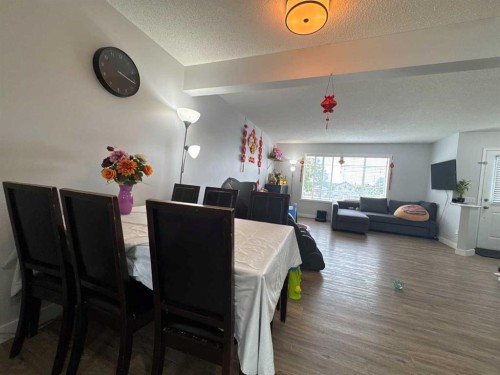 8-304 Ross Avenue, Cochrane, AB - Indoor Photo Showing Dining Room