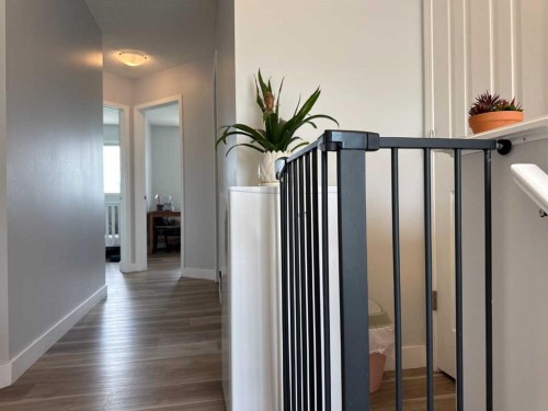 8-304 Ross Avenue, Cochrane, AB - Indoor Photo Showing Other Room