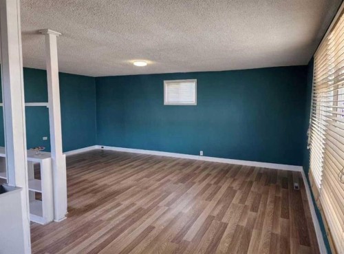 2111 19 Street, Nanton, AB - Indoor Photo Showing Other Room