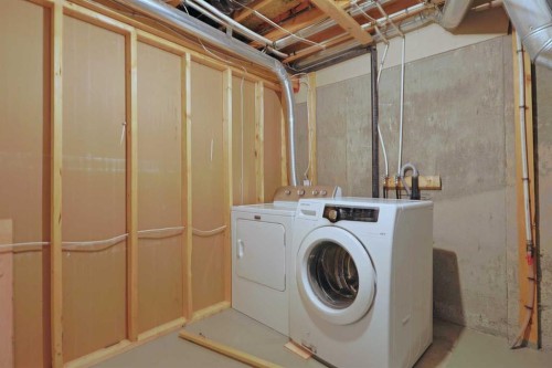 322 Country Village Cape Ne, Calgary, AB - Indoor Photo Showing Laundry Room