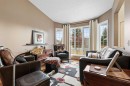 1208 Sunvista Way Se, Calgary, AB  - Indoor Photo Showing Living Room 