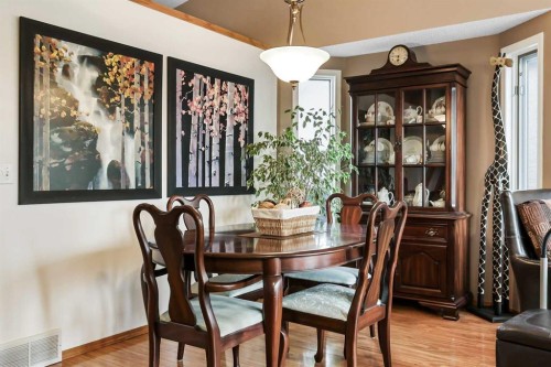 1208 Sunvista Way Se, Calgary, AB - Indoor Photo Showing Dining Room