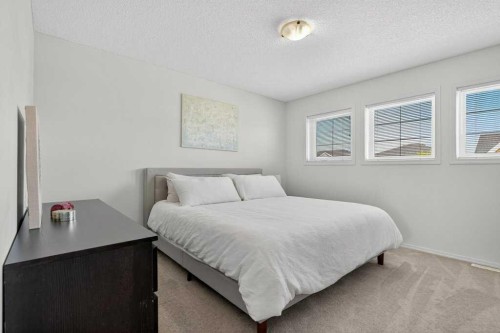 243 Redstone Drive Ne, Calgary, AB - Indoor Photo Showing Bedroom