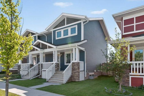 243 Redstone Drive Ne, Calgary, AB - Outdoor With Deck Patio Veranda With Facade