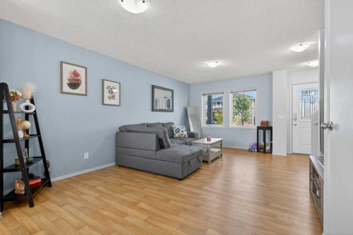 243 Redstone Drive Ne, Calgary, AB - Indoor Photo Showing Living Room