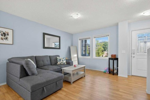 243 Redstone Drive Ne, Calgary, AB - Indoor Photo Showing Living Room