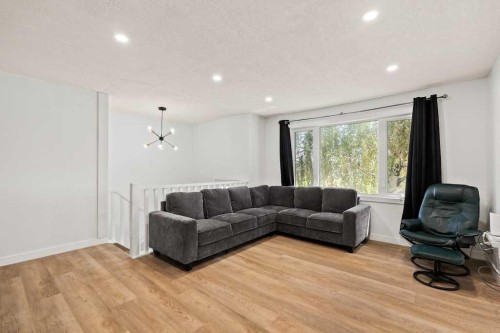 856 Rundlecairn Way Ne, Calgary, AB - Indoor Photo Showing Living Room