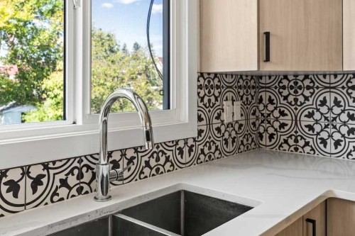 856 Rundlecairn Way Ne, Calgary, AB - Indoor Photo Showing Kitchen With Double Sink