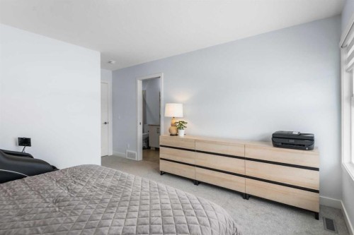 158 Magnolia Path Se, Calgary, AB - Indoor Photo Showing Bedroom