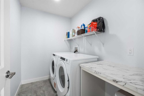 158 Magnolia Path Se, Calgary, AB - Indoor Photo Showing Laundry Room