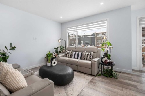 158 Magnolia Path Se, Calgary, AB - Indoor Photo Showing Living Room