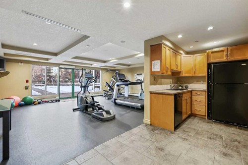 432-3111 34 Avenue Nw, Calgary, AB - Indoor Photo Showing Gym Room