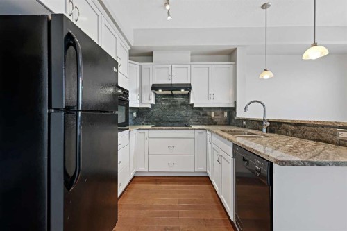 432-3111 34 Avenue Nw, Calgary, AB - Indoor Photo Showing Kitchen With Double Sink With Upgraded Kitchen