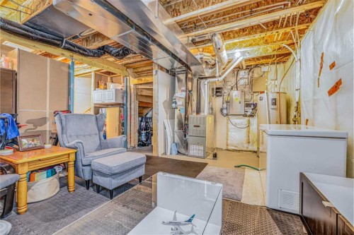 30 Nolanfield Heights Nw, Calgary, AB - Indoor Photo Showing Basement