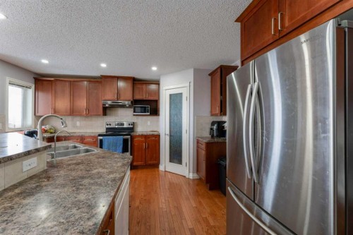 236 Willowmere Way, Chestermere, AB - Indoor Photo Showing Kitchen With Double Sink