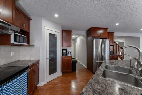 236 Willowmere Way, Chestermere, AB - Indoor Photo Showing Kitchen With Double Sink