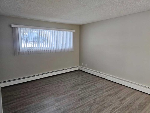 105-5812 61 Street, Red Deer, AB - Indoor Photo Showing Other Room