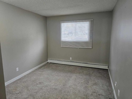 105-5812 61 Street, Red Deer, AB - Indoor Photo Showing Other Room