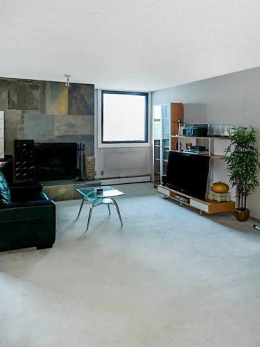 703-215 14 Avenue Sw, Calgary, AB - Indoor With Fireplace