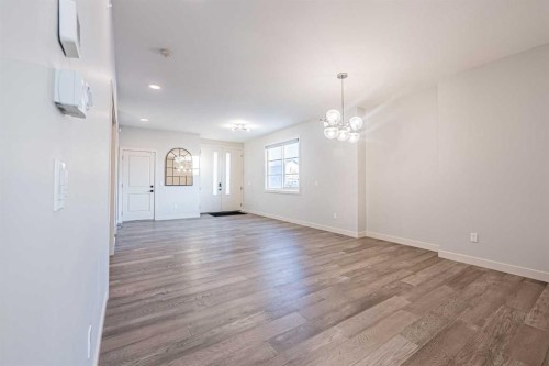 300 Savanna Way Ne, Calgary, AB - Indoor Photo Showing Other Room