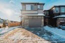 300 Savanna Way Ne, Calgary, AB  - Outdoor With Facade 
