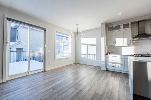 300 Savanna Way Ne, Calgary, AB - Indoor Photo Showing Kitchen With Upgraded Kitchen