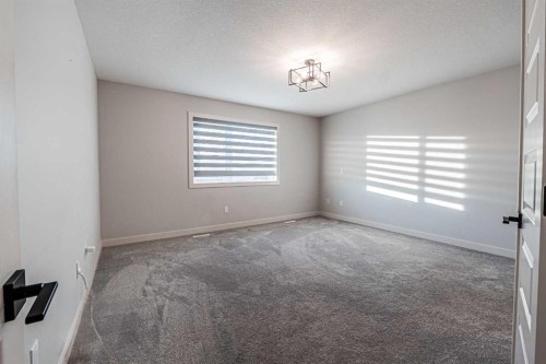300 Savanna Way Ne, Calgary, AB - Indoor Photo Showing Other Room