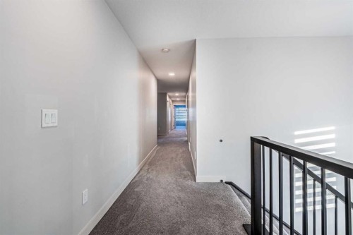 300 Savanna Way Ne, Calgary, AB - Indoor Photo Showing Other Room