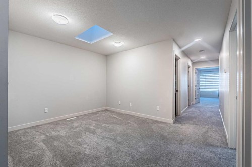 300 Savanna Way Ne, Calgary, AB - Indoor Photo Showing Other Room
