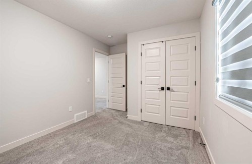 300 Savanna Way Ne, Calgary, AB - Indoor Photo Showing Other Room
